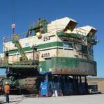 When mining companies need to rebuild their face shovels, they use cranes and jack and skate systems to lift them off their tracks.